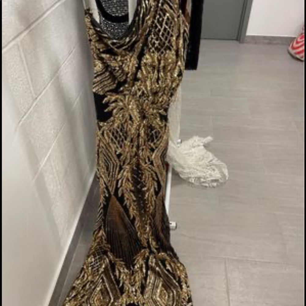 Black and gold sequin dress